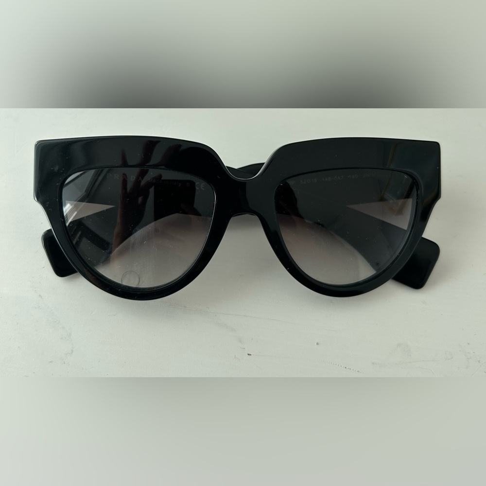 Prada Poeme black chunky sunglasses.